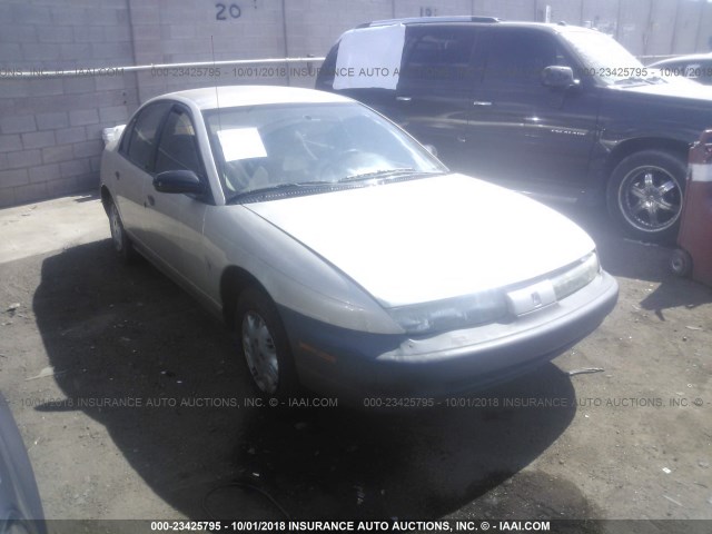 1G8ZH5288XZ260291 - 1999 SATURN SL1 TAN photo 1