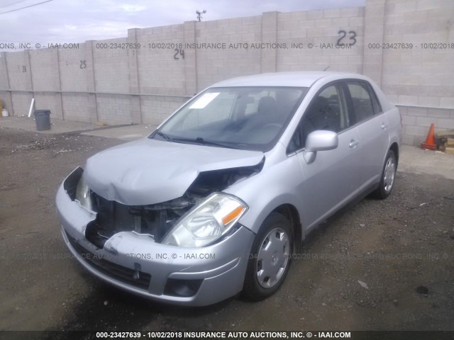 3N1BC11E59L385154 - 2009 NISSAN VERSA S/SL SILVER photo 2