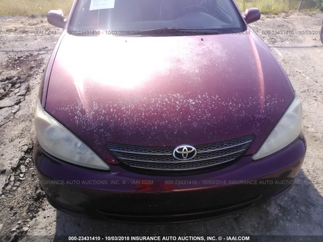 4T1BE32K94U303010 - 2004 TOYOTA CAMRY LE/XLE/SE Қызыл фото 6