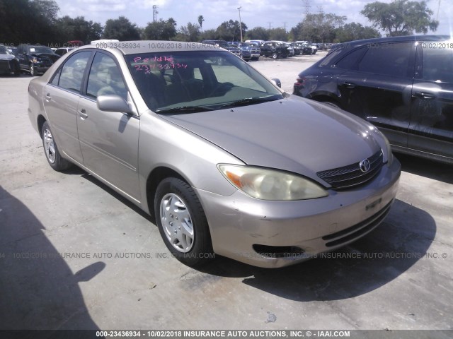 JTDBE32K330238164 - 2003 TOYOTA CAMRY LE/XLE GOLD photo 1