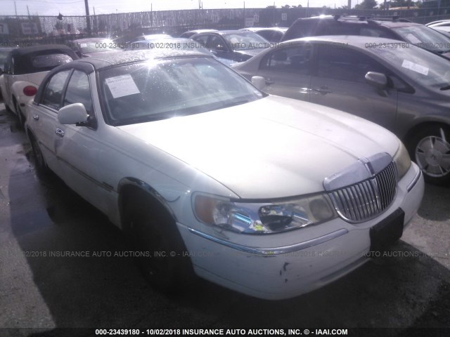 1LNHM83W7XY636007 - 1999 LINCOLN TOWN CAR CARTIER WHITE photo 1