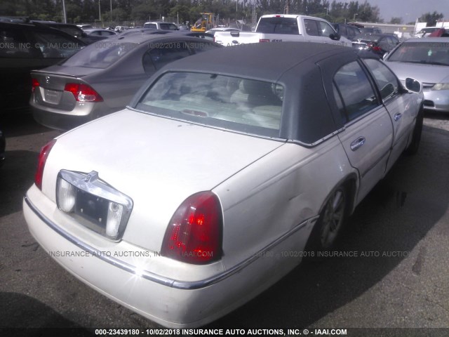 1LNHM83W7XY636007 - 1999 LINCOLN TOWN CAR CARTIER WHITE photo 4