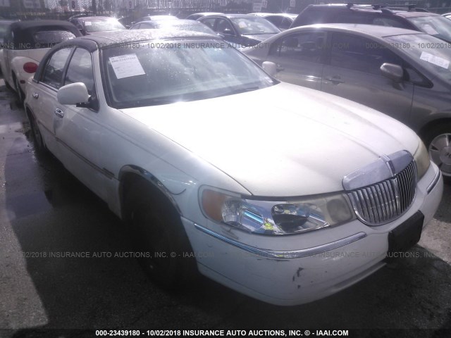 1LNHM83W7XY636007 - 1999 LINCOLN TOWN CAR CARTIER WHITE photo 6