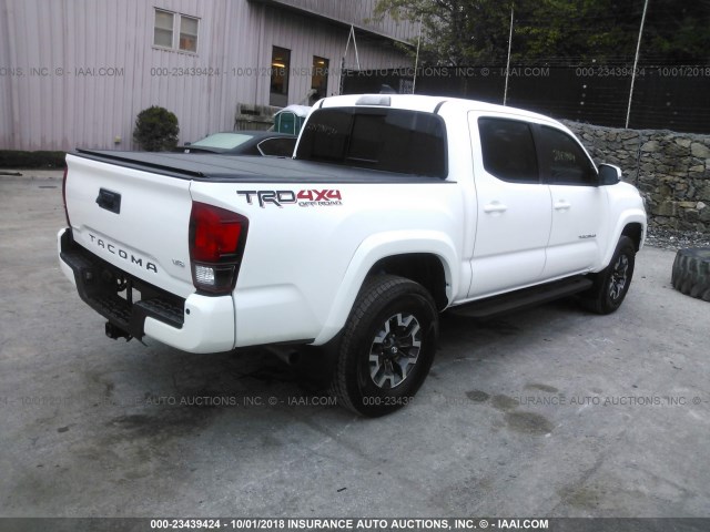 3TMCZ5AN6JM144113 - 2018 TOYOTA TACOMA DOUBLE CAB/SR/SR5/TRD SPO თეთრი ფოტო 4