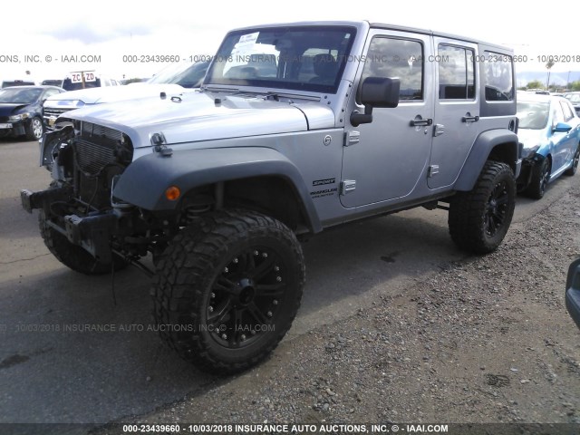 1C4BJWDG5FL740845 - 2015 JEEP WRANGLER UNLIMITE SPORT SILVER photo 2