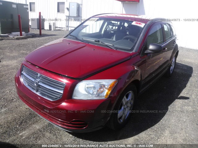 1B3HB48A79D108382 - 2009 DODGE CALIBER SXT RED photo 2