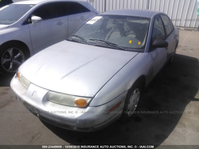 1G8ZH52832Z112476 - 2002 SATURN SL1 GRAY photo 2