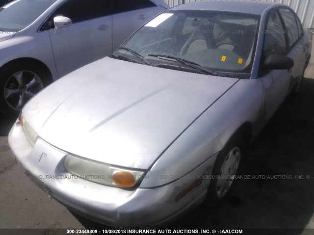 1G8ZH52832Z112476 - 2002 SATURN SL1 GRAY photo 6