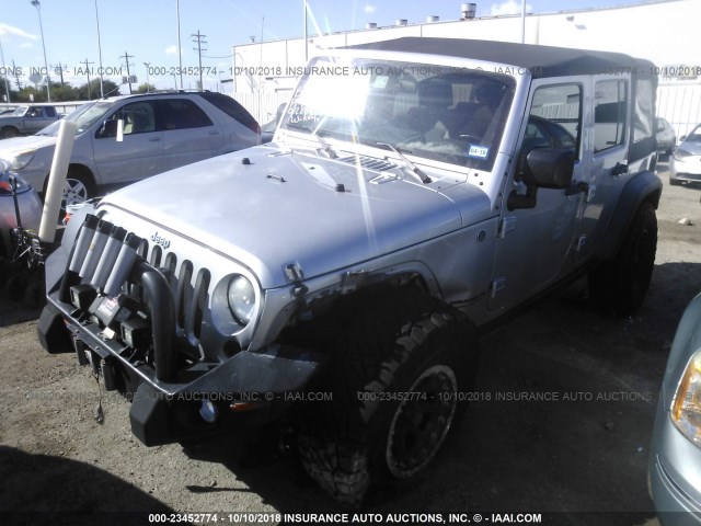 1J4BA3H10AL166064 - 2010 JEEP WRANGLER UNLIMITE SPORT SILVER photo 2