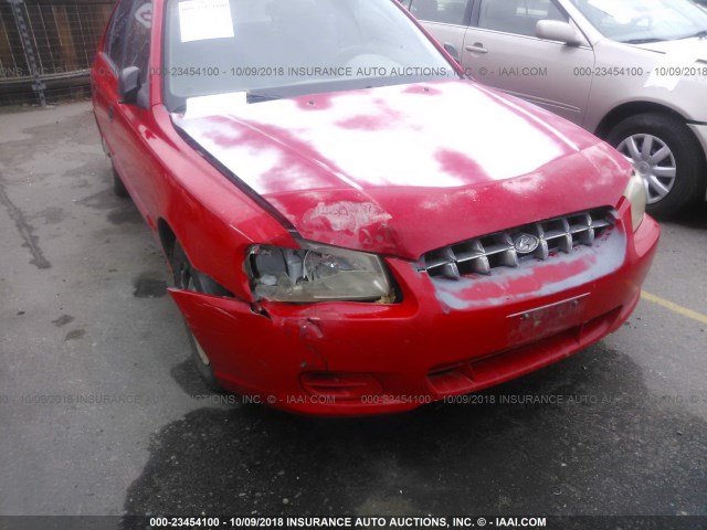 KMHCG45G5YU129941 - 2000 HYUNDAI ACCENT GL RED photo 6