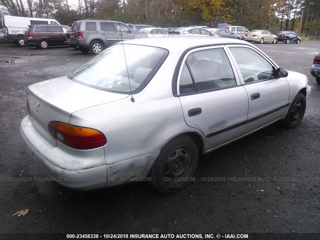 1Y1SK5280XZ413573 - 1999 CHEVROLET GEO PRIZM LSI SILVER photo 4