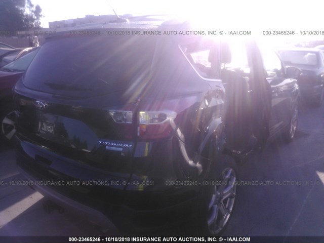 1FMCU0J98HUA04375 - 2017 FORD ESCAPE TITANIUM BLACK photo 4