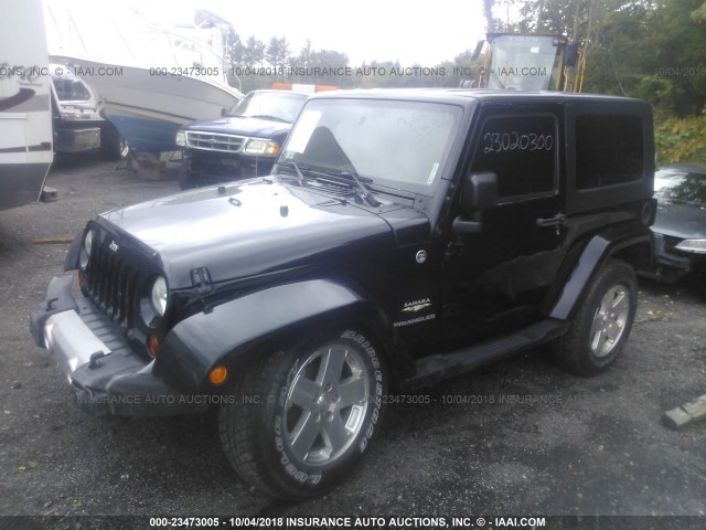 1J8FA541X9L755104 - 2009 JEEP WRANGLER SAHARA BLACK photo 2