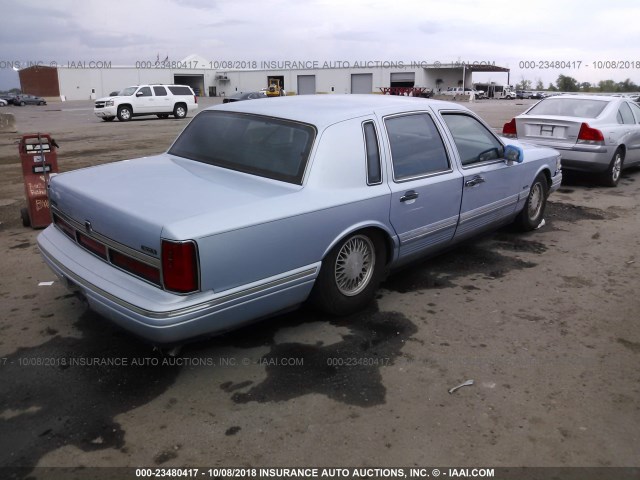 1LNLM82W6VY734549 - 1997 LINCOLN TOWN CAR SIGNATURE/TOURING BLUE photo 4