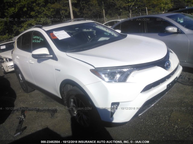 JTMRJREVXGD043423 - 2016 TOYOTA RAV4 HV XLE WHITE photo 1