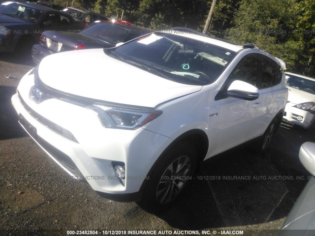 JTMRJREVXGD043423 - 2016 TOYOTA RAV4 HV XLE WHITE photo 2