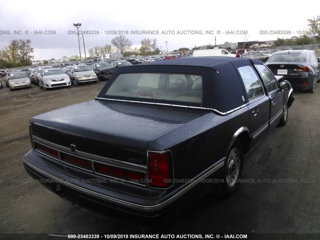 1LNLM81W0VY732877 - 1997 LINCOLN TOWN CAR EXECUTIVE Dark Blue photo 4