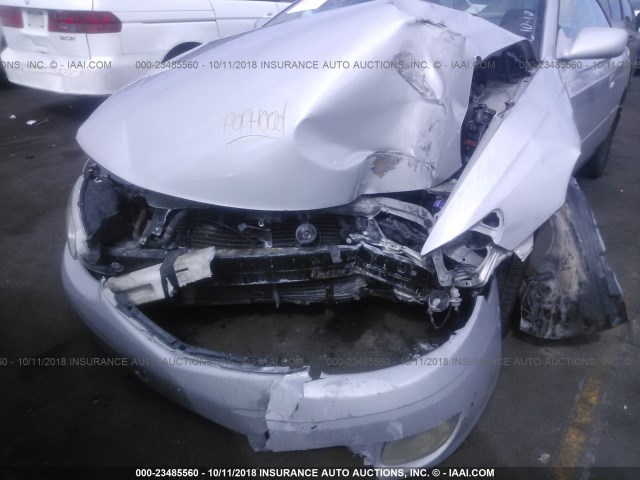 2T1CG22P11C422882 - 2001 TOYOTA CAMRY SOLARA SE SILVER photo 10