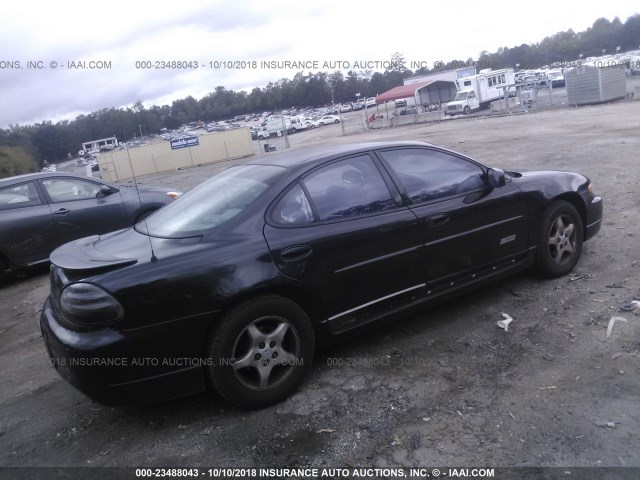 1G2WP521XVF250301 - 1997 PONTIAC GRAND PRIX GTP BLACK photo 4