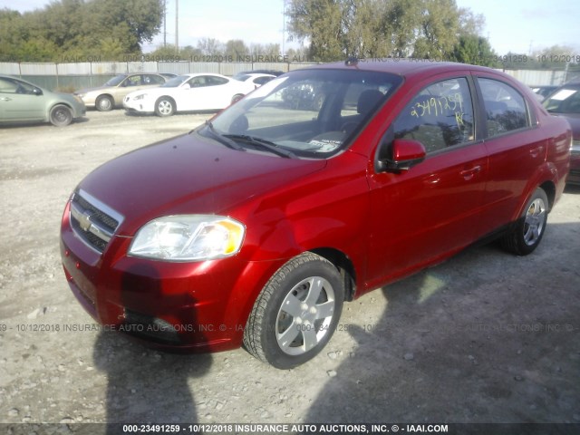 KL1TD5DE2AB132677 - 2010 CHEVROLET AVEO LS/LT RED photo 2