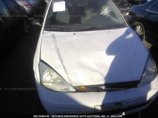 1FAFP3832YW291833 - 2000 FORD FOCUS ZTS WHITE photo 6