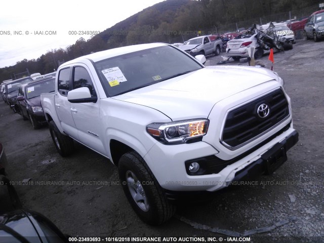 5TFCZ5AN5GX016643 - 2016 TOYOTA TACOMA DBL CAB/SR/SR5/TRD SPT/OR WHITE photo 1