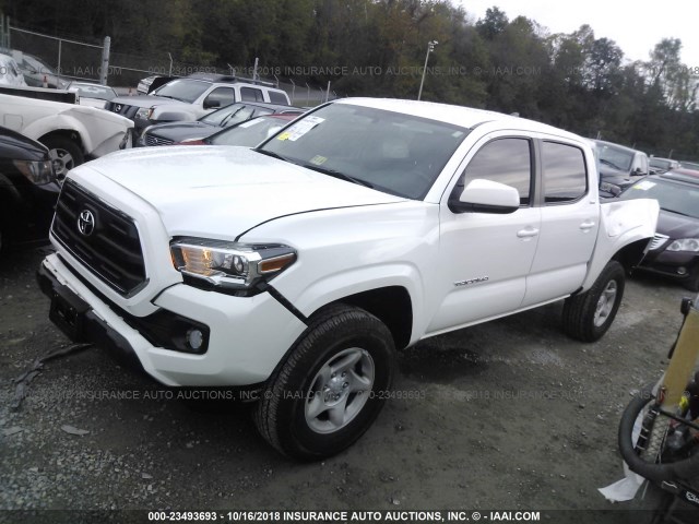 5TFCZ5AN5GX016643 - 2016 TOYOTA TACOMA DBL CAB/SR/SR5/TRD SPT/OR WHITE photo 2