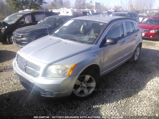 1B3CB3HA5AD591315 - 2010 DODGE CALIBER MAINSTREET SILVER photo 2