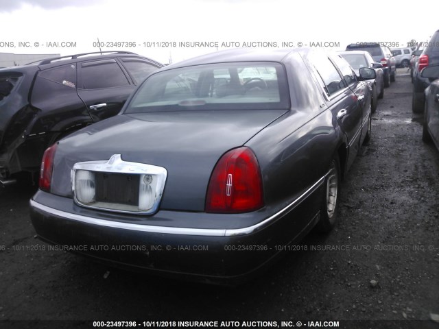 1LNHM81W3YY794073 - 2000 LINCOLN TOWN CAR EXECUTIVE BLACK photo 4