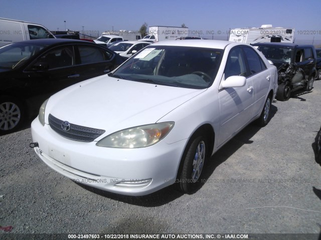 JTDBE32K840278547 - 2004 TOYOTA CAMRY LE/XLE WHITE photo 2