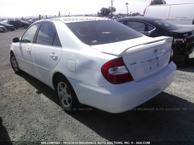 JTDBE32K840278547 - 2004 TOYOTA CAMRY LE/XLE WHITE photo 3