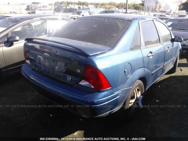 1FAFP3431YW417136 - 2000 FORD FOCUS SE/SE SPORT BLUE photo 4