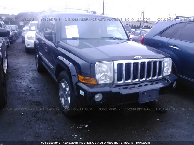 1J8HG58236C299615 - 2006 JEEP COMMANDER LIMITED BLACK photo 1