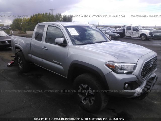 5TFSZ5AN1JX144221 - 2018 TOYOTA TACOMA ACCESS CAB/SR5/TRD SPT/OR SILVER photo 1