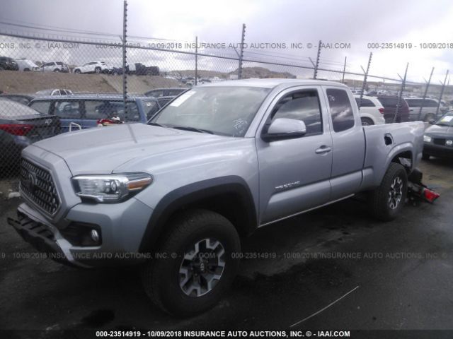 5TFSZ5AN1JX144221 - 2018 TOYOTA TACOMA ACCESS CAB/SR5/TRD SPT/OR SILVER photo 2