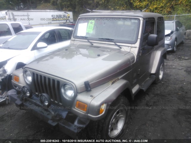 1J4FA59S64P750423 - 2004 JEEP WRANGLER / TJ SAHARA TAN photo 2