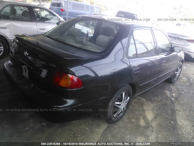 1NXBR12E7WZ067298 - 1998 TOYOTA COROLLA VE/CE/LE BLACK photo 4