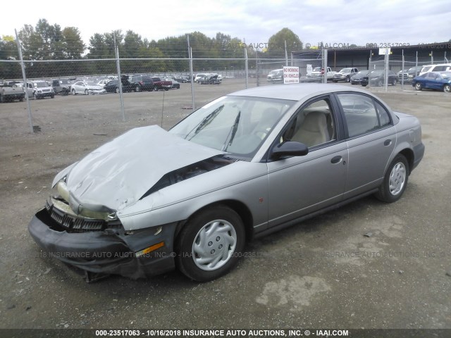 1G8ZF5283XZ324825 - 1999 SATURN SL SILVER photo 2