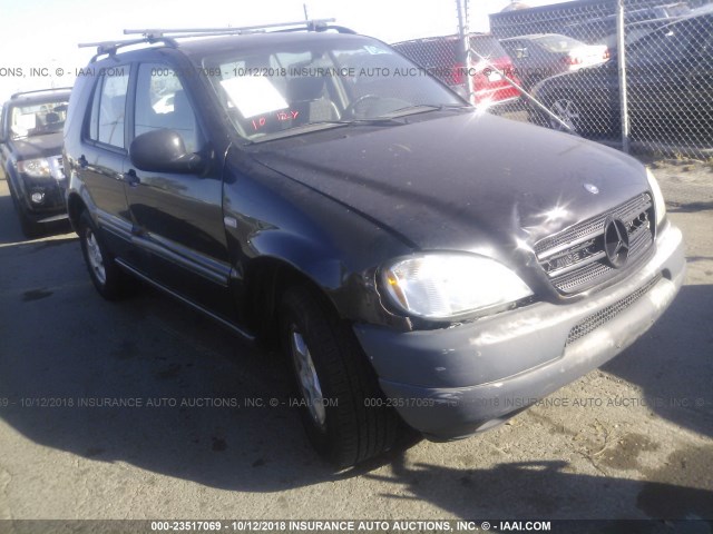 4JGAB54E0XA056859 - 1999 MERCEDES-BENZ ML 320 BLACK photo 1