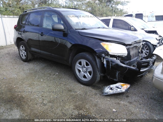 2T3ZF4DV0BW092292 - 2011 TOYOTA RAV4 BLACK photo 1