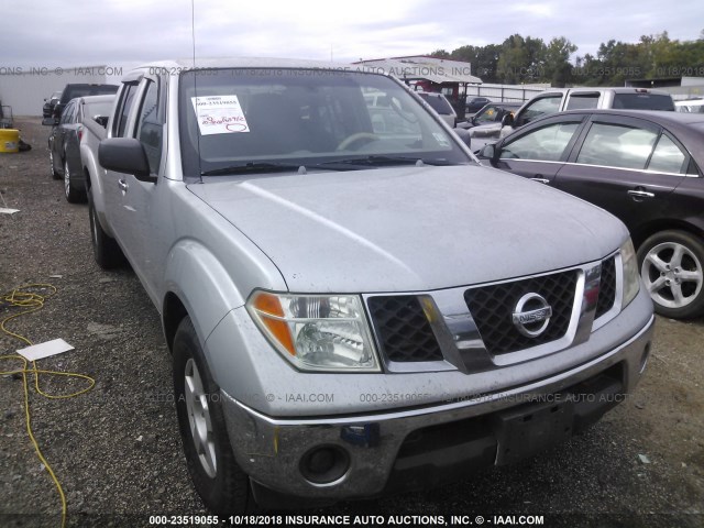 1N6AD09U47C409803 - 2007 NISSAN FRONTIER CREW CAB LE/SE/OFF ROAD SILVER photo 1