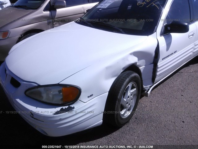 1G2NE52EXXC565396 - 1999 PONTIAC GRAND AM SE WHITE photo 6