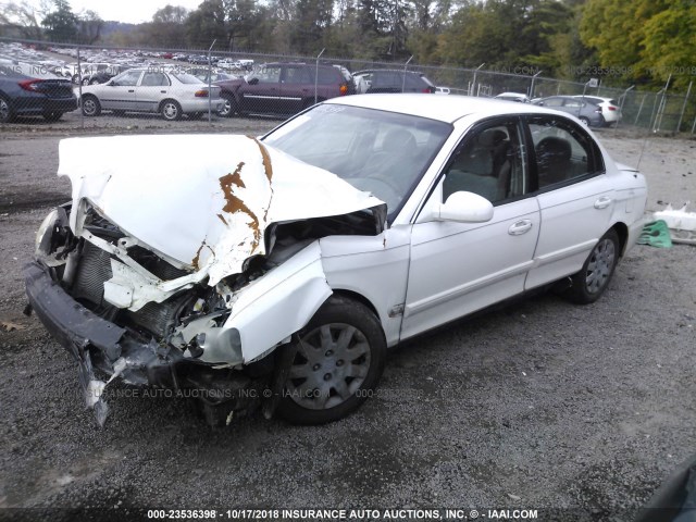 KNAGD126845341159 - 2004 KIA OPTIMA LX/EX WHITE photo 2