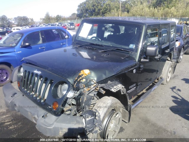 1J4BZ3H13BL553816 - 2011 JEEP WRANGLER UNLIMITE SPORT GREEN photo 1