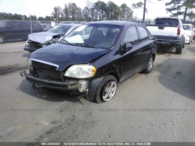 KL1TD5DE9BB193106 - 2011 CHEVROLET AVEO LS/LT Սև լուսանկար 2
