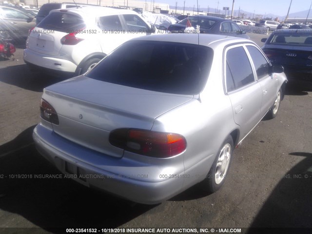 1Y1SK5280WZ419324 - 1998 CHEVROLET GEO PRIZM LSI GRAY photo 4