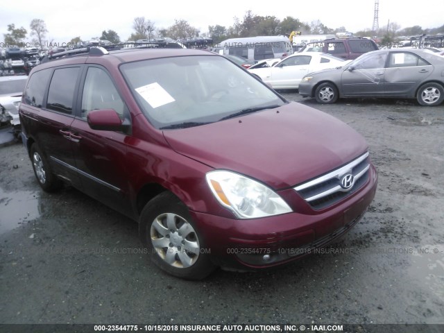 KNDMC233276029243 - 2007 HYUNDAI ENTOURAGE GLS/SE/LIMITED RED photo 1