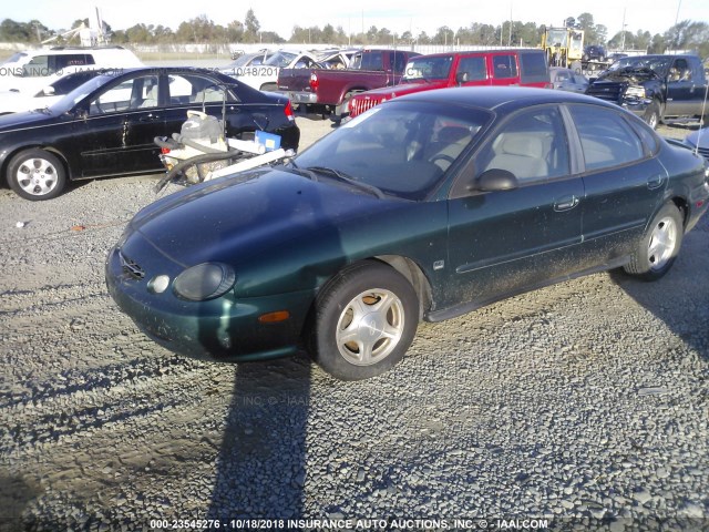 1FAFP53S6XG206821 - 1999 FORD TAURUS SE/COMFORT/SPORT GREEN photo 2