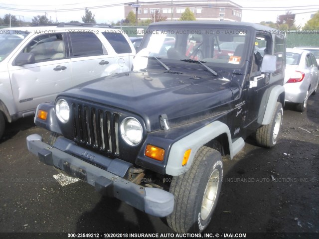 1J4FY19S1XP494328 - 1999 JEEP WRANGLER / TJ SPORT BLACK photo 2