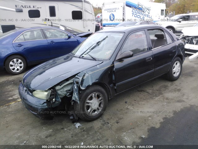 1Y1SK5284XZ447046 - 1999 CHEVROLET GEO PRIZM LSI GREEN photo 2